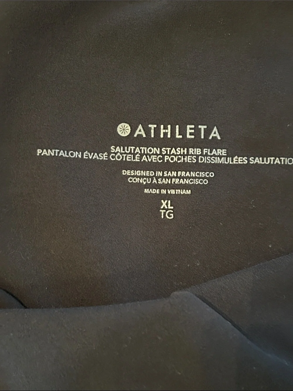 Athleta Salutation Stash Ribbed Flare Pants Black Sz XL Athleisure Pockets